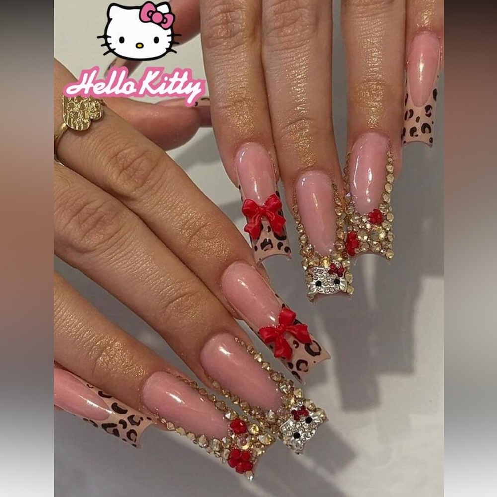 Hello Kitty cheetah print and Red Bow Press-On Nails with rhinestones